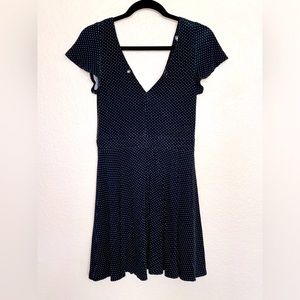 Mini American Eagle Outfitters black and white polka dot dress.